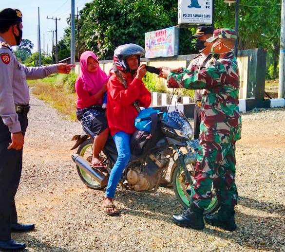 TNI POLRI di Kecamatan Rambah Samo Laksanakan Ops Yustisi