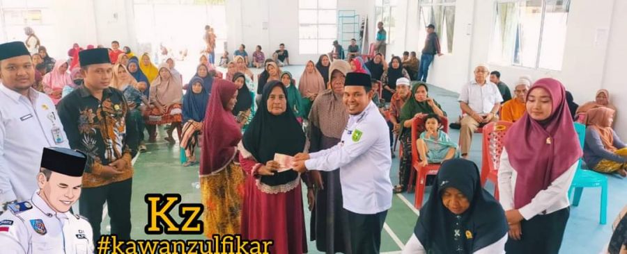 Zulfikar S,HI dan Amros A.MA Salurkan BLT-DD Ke 140 KPM